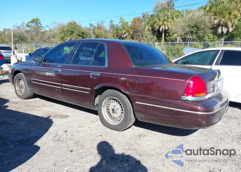 2001 Ford Crown Victoria Lx z USA, uszkodzony, nr VIN 2FAFP74W51X133116